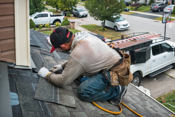 Professional Roofing technician working in Marlborough, MO